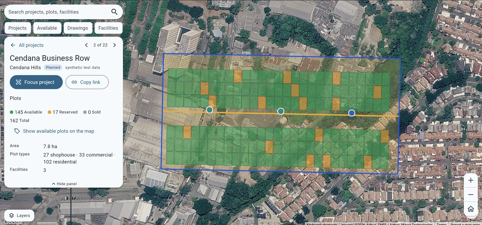 Individual plots inside a development shown over satellite imagery, each coloured by whether it is available or reserved